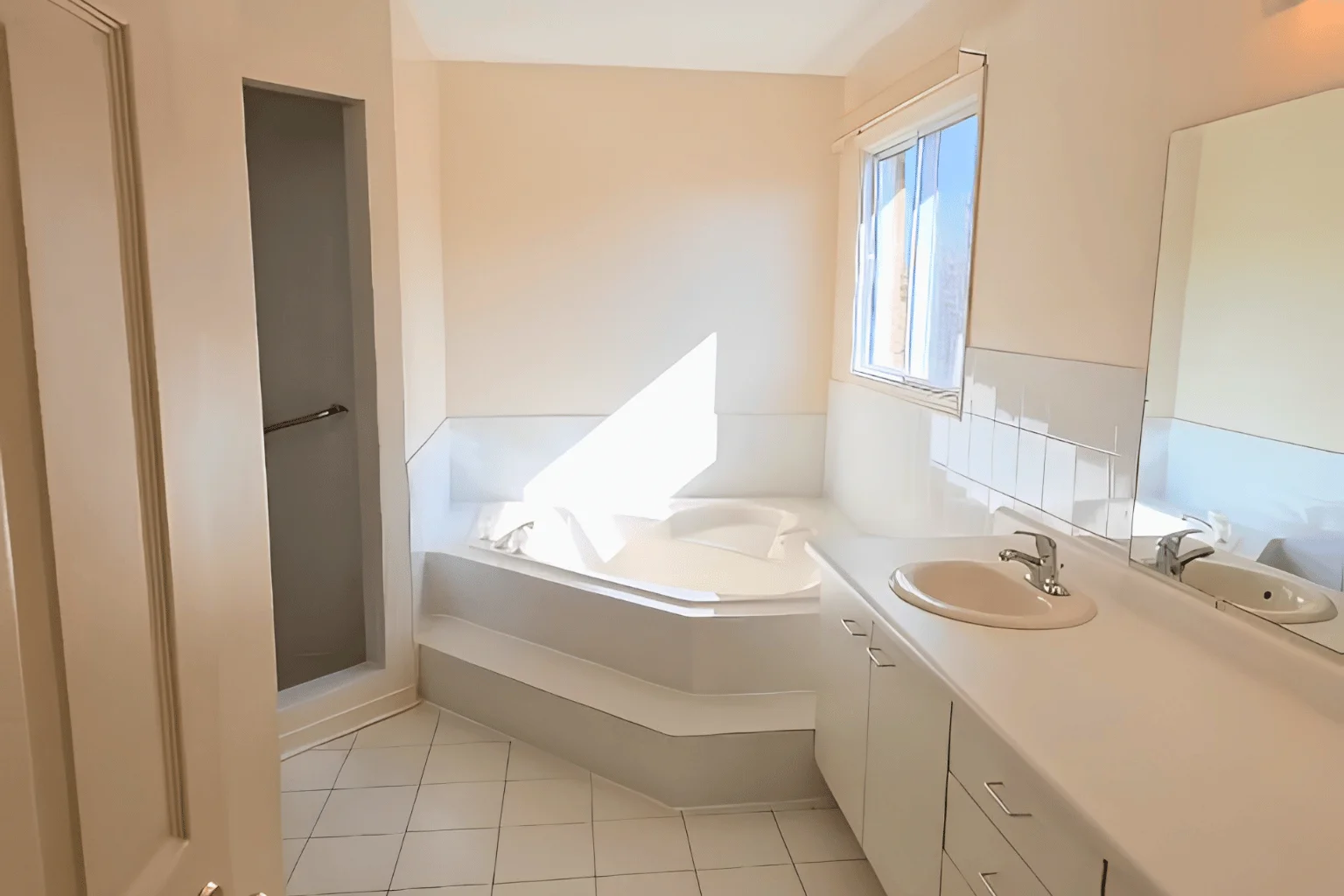 Before bathroom remodel project showing an outdated bathroom space before renovation by BathGuys.